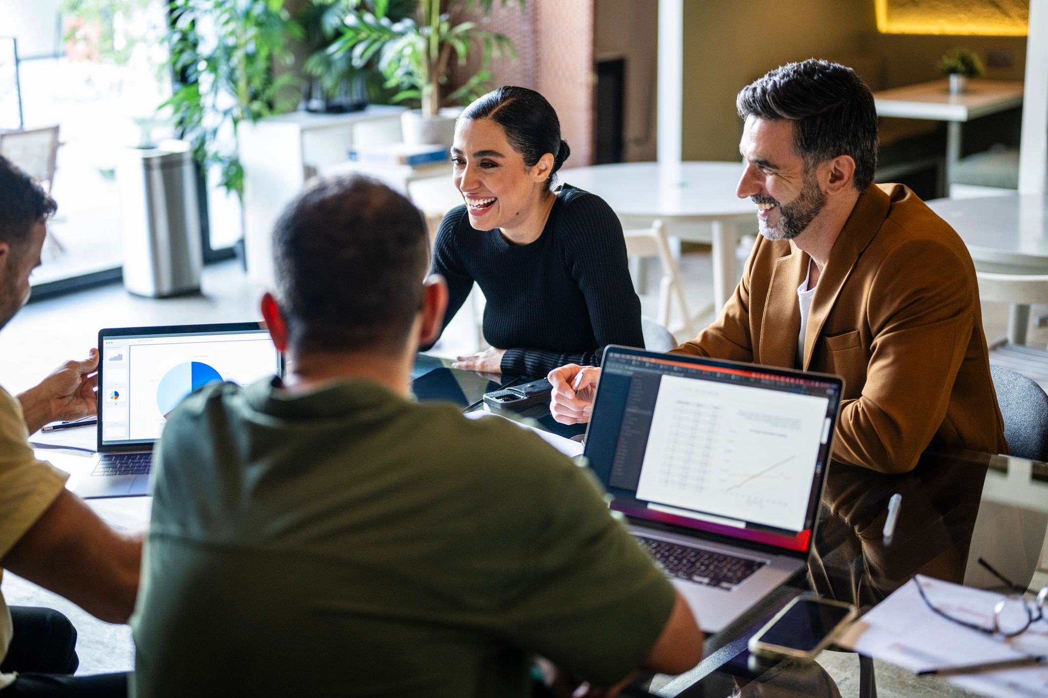 Financial professionals collaborating at a meeting table
