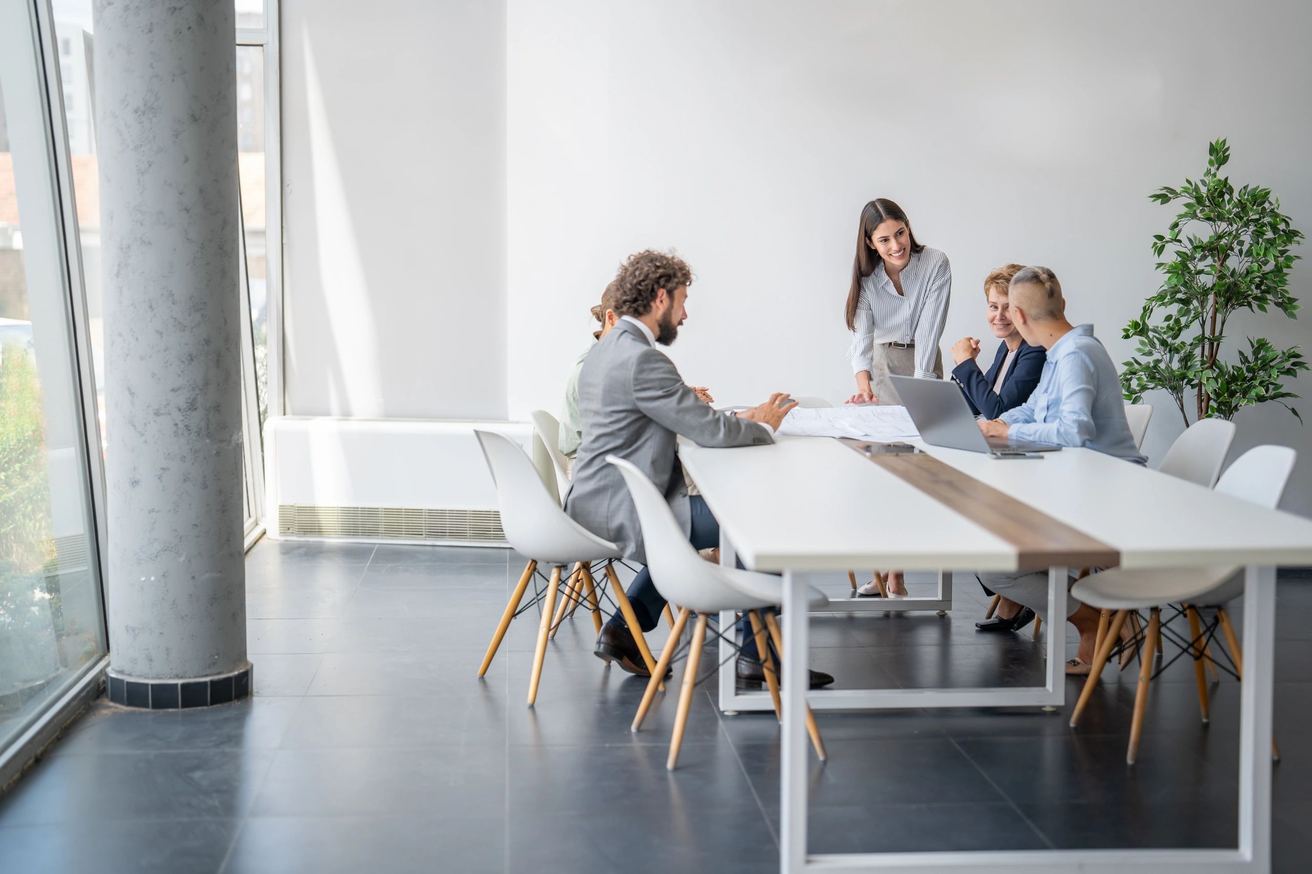 Professionals collaborating in an office meeting room